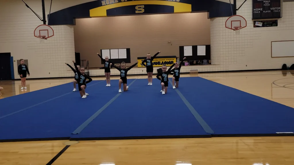 cheerleaders-on-blue-mat